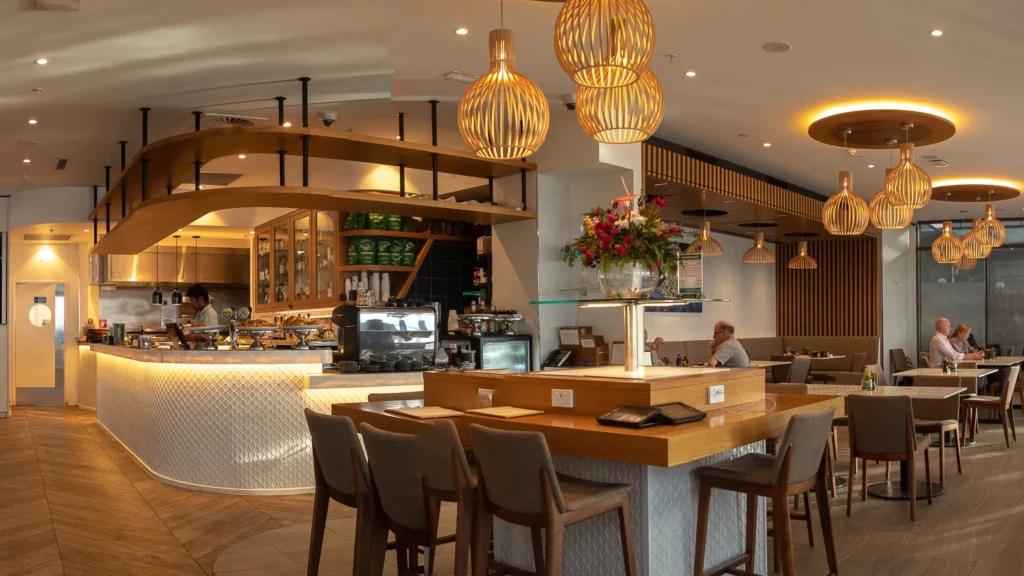 Port Terrace restaurant and bar tables and chairs with bar in background